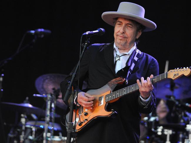 Bob Dylan strums away at Vieilles Charrues music festival in Carhaix-Plouguer, France in 2012. Picture: AFP