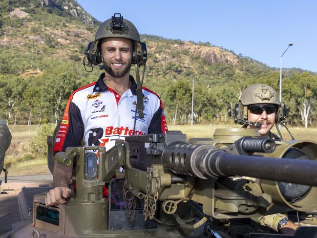 Supercar driver Andre Heimgartner on board a 2nd Cavalry Regiment tank at Lavarack Barracks in Townsville ahead of the NTI Townsville 500. Picture: Mark Horsburgh / Supercars Media