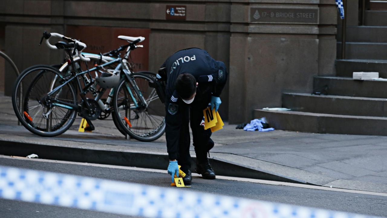 Police at the crime scene. Picture: Adam Yip