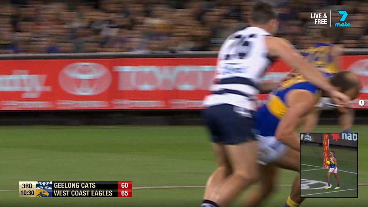 Geelong's Tom Hawkins collects West Coast's Will Schofield in the head.
