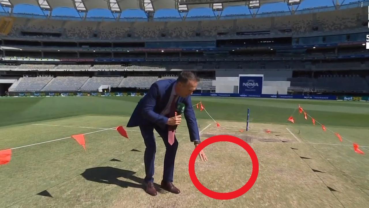 Michael Vaughan inspects the pitch on Fox Cricket.