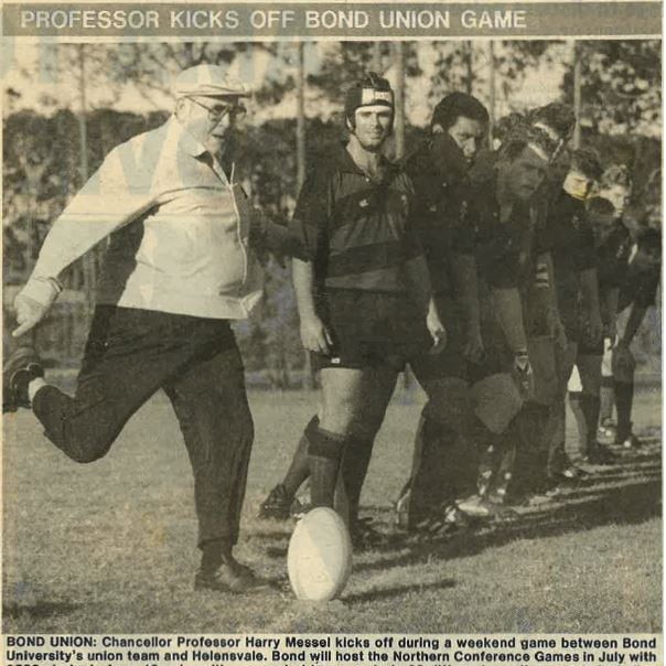 Bond University’s third Vice Chancellor, the late Professor Harry Messel, kicks off at a club game (clipping from the Gold Coast Bulletin). Photo: Supplied