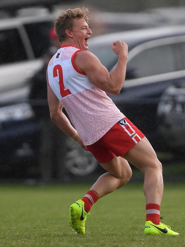 Karingal recruit Matthew Robinson celebrates after slotting a goal. Picture: Andy Brownbill