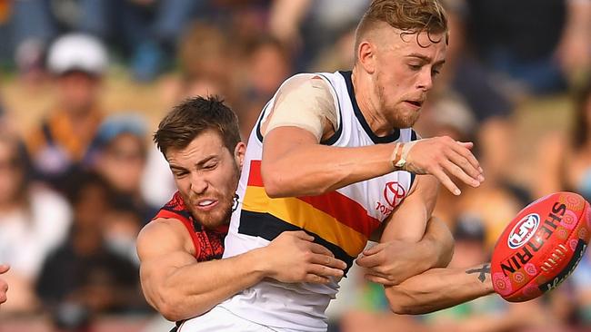 Melbourne’s Jack Viney wraps up Hugh Greenwood on Sunday. Picture: Quinn Rooney/Getty Images