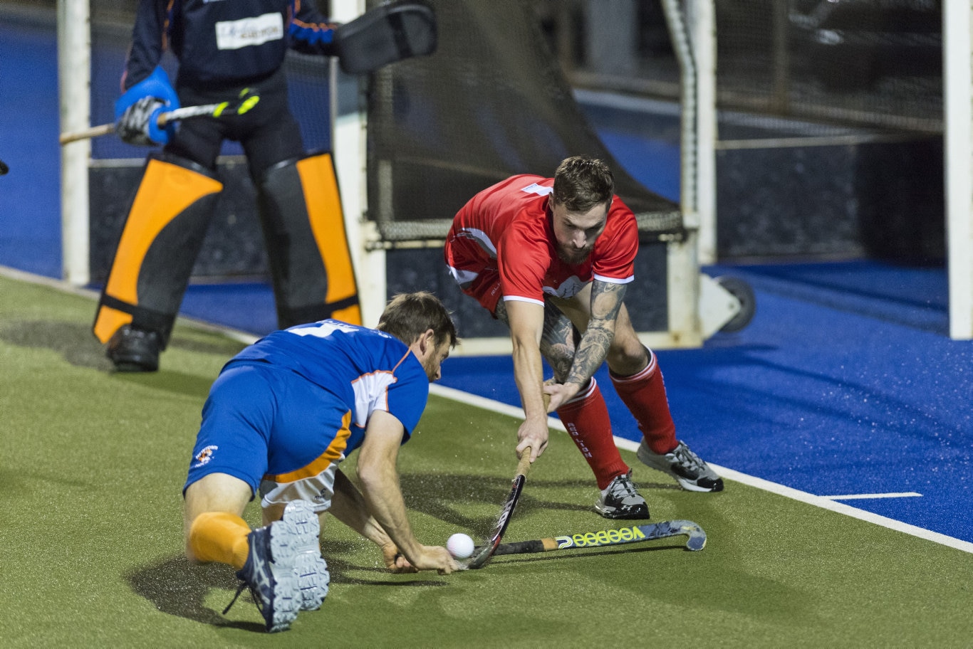 Craig Richards (left) of Newtown tackles Bradley Hobday of Red Lion in Toowoomba Hockey COVID Cup men round four at Clyde Park, Friday, July 31, 2020. Picture: Kevin Farmer