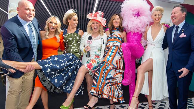 Network 10 marquee: Peter Moody, Brittany Taylor, Francesca Cumani, Kerri-Anne Kennerley, Jennifer Keyte, Kate Beck and Matt White with the mysterious performer. Picture: Jay Town