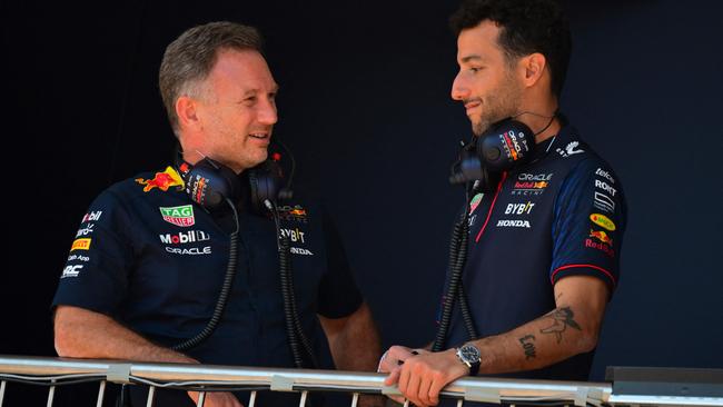 Christian Horner speaks with Daniel Ricciardo ahead of a practice session at the Monaco Grand Prix. Picture: ANDREJ ISAKOVIC / AFP