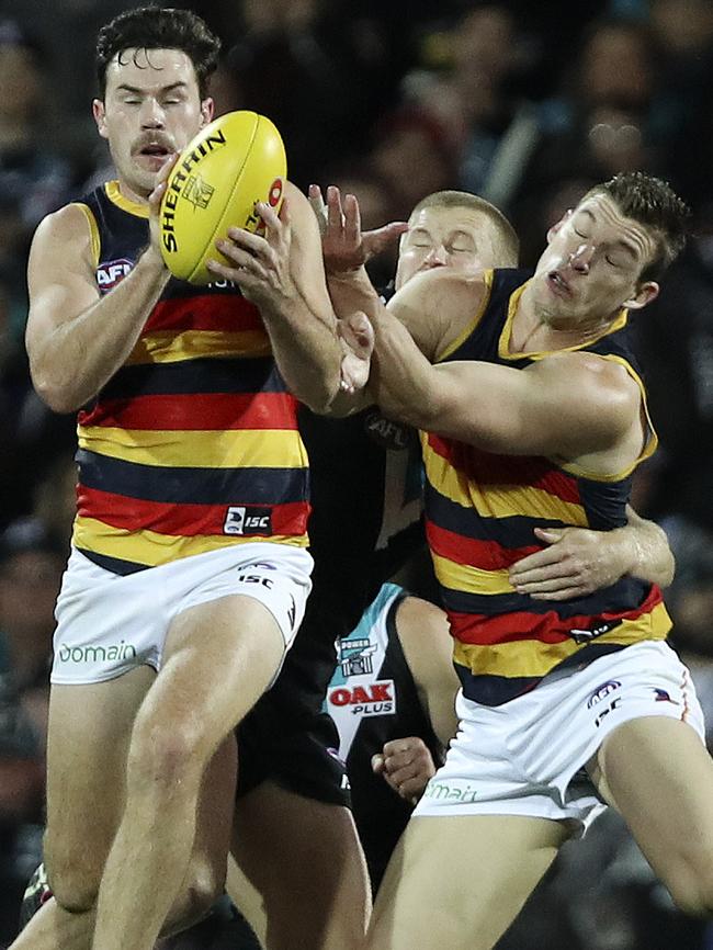 Mitch McGovern takes a contested mark. Picture: Sarah Reed