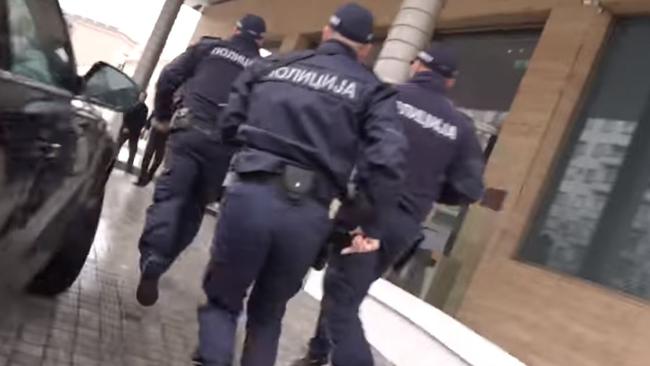 Police storm a Belgrade hotel to make the arrests. Picture: Serbian Interior Ministry