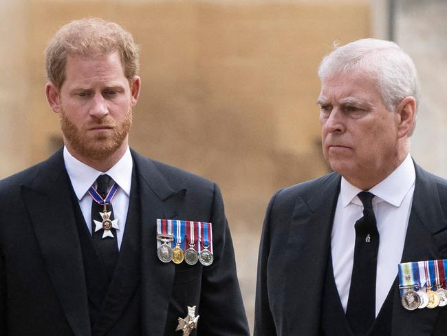 Britain's Prince Harry, Duke of Sussex (L) talks with Britain's Prince Andrew, Duke of York as they arrive at St George's Chapel inside Windsor Castle on September 19, 2022, ahead of the Committal Service for Britain's Queen Elizabeth II. - Monday's committal service is expected to be attended by at least 800 people, most of whom will not have been at the earlier State Funeral at Westminster Abbey. (Photo by David Rose / POOL / AFP)