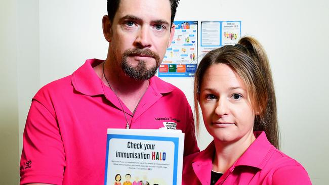 Ash and Sally Lawrence hold the new immunization poster, have been strong advocates for the Meningococcal B vaccine after losing their young daughter Skylar. Picture: Justin Kennedy