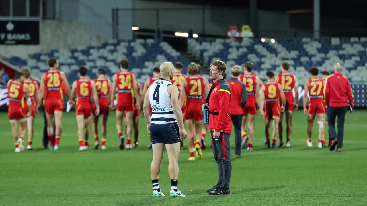 Gary Ablett of the Cats talks with young gun Matthew Rowell of the Suns after game. Picture: Michael Klein