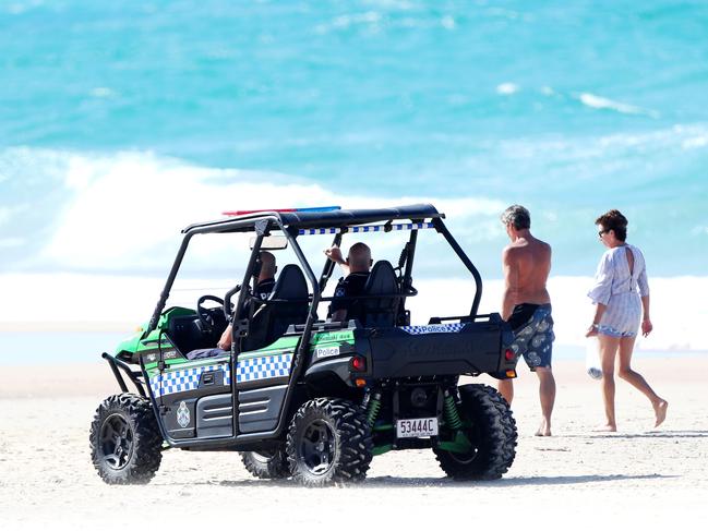 Police on patrol at Burleigh Heads beach. Picture: Nigel Hallett