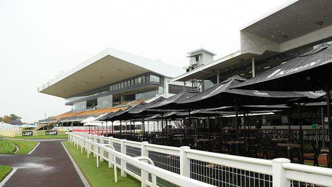 Monday’s Doomben meeting hangs in the balance with heavy rain expected. Photo: AAP Image/Albert Perez