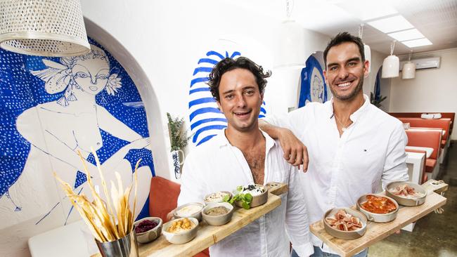 Champion ironman Matt Poole (right) with business partner Oliver Frost (left), with whom he opened a new restaurant called Maman in Burleigh Heads. Picture: NIGEL HALLETT