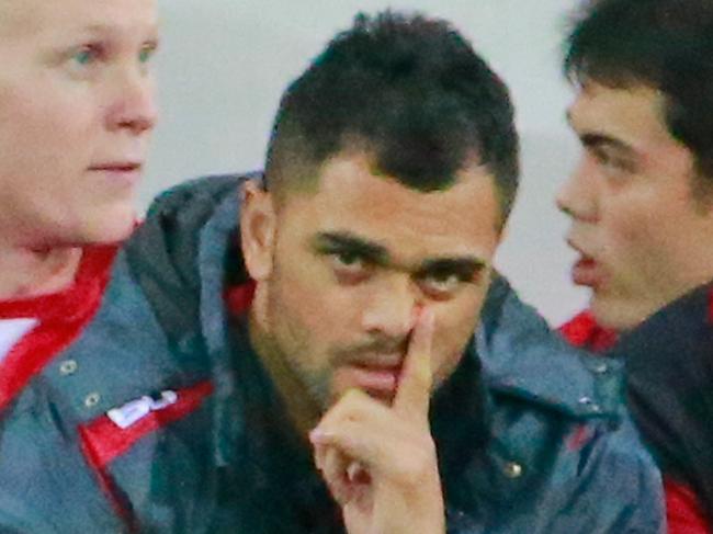 MELBOURNE, AUSTRALIA - APRIL 03: Karmichael Hunt of the Reds looks on from the bench during the round eight Super Rugby match between the Rebels and the Reds at AAMI Park on April 3, 2015 in Melbourne, Australia. (Photo by Scott Barbour/Getty Images)