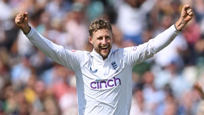 Joe Root celebrates the wicket of Alex Carey. (Photo by Stu Forster/Getty Images)