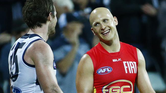 Gold Coast captain Gary Ablett has a laugh with Geelong star Patrick Dangerfield. Picture: Colleen Petch