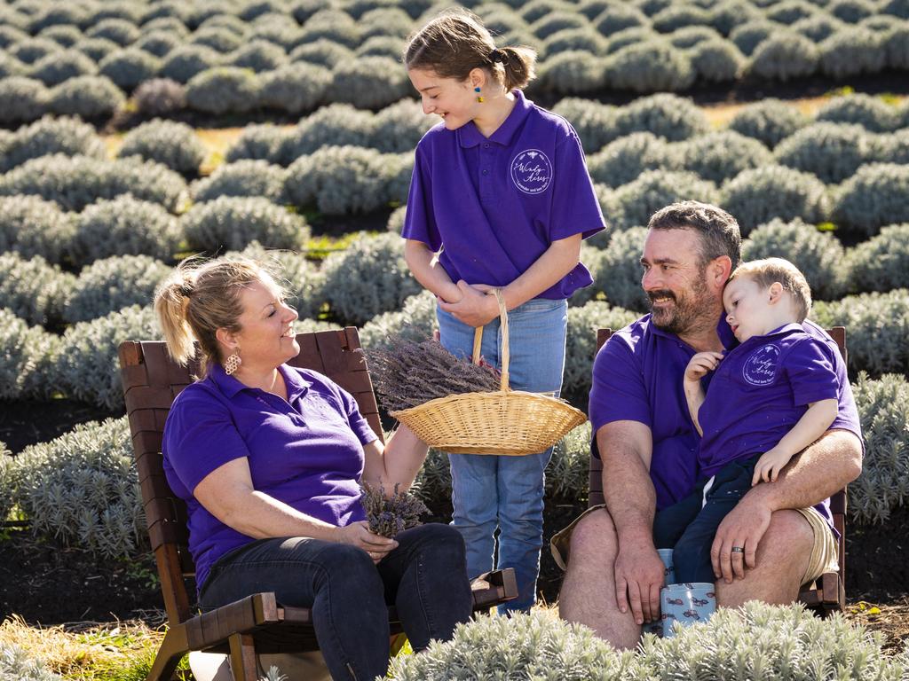 Windy Acres Farm owners Craig and Alicia Vohland, with kids Mia and Noah, are inviting families to play among the lavender bushes this Easter. Picture: Kevin Farmer