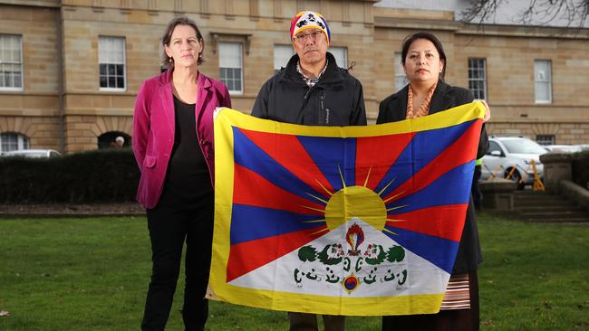 Cassy O'Connor with Hobart Tibetan community members Karma Phuntsok and Tenzin Sangmo. Cassy O'Connor along with members of the Hobart Tibetan community are concerned about the installation of CCTV on parliament lawns. Picture: NIKKI DAVIS-JONES