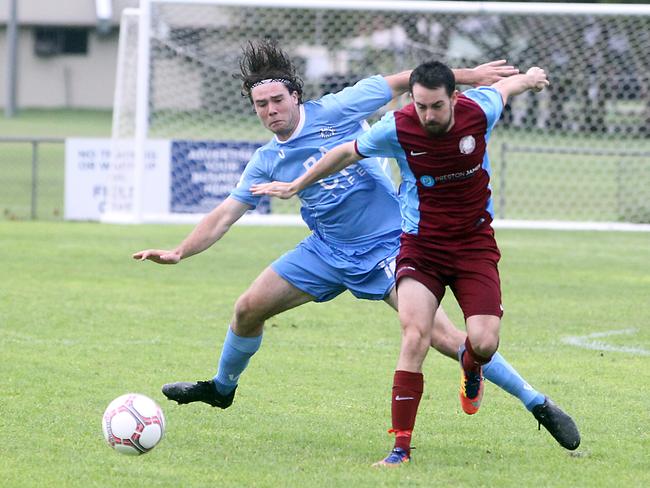 Gold Coast Premier League football - Palm Beach vs. Coomera (maroon) at Duncan McKenna Field.Photo of blue 12, red 19.Photo by Richard Gosling