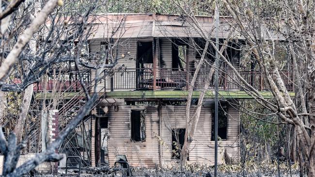 Property damage in the aftermath of a severe grass fire on Mira Rd, Southport. Picture: Glenn Campbell