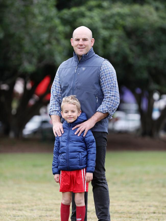 Wallaby Stephen Moore with his rugby loving son Theodore. Picture: Tara Crose