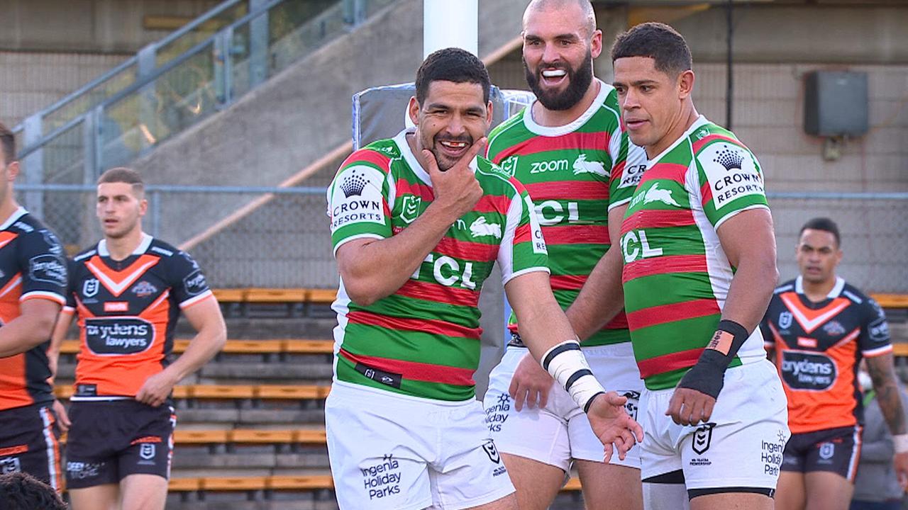 Cody Walker celebrates scoring against the Tigers.