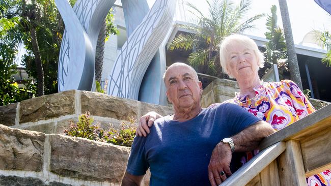 Norbert Wyzenbeek and wife Sharon with the statue, they have been ordered to remove the Holocaust memorial by Willoughby Council - Photo Jeremy Piper