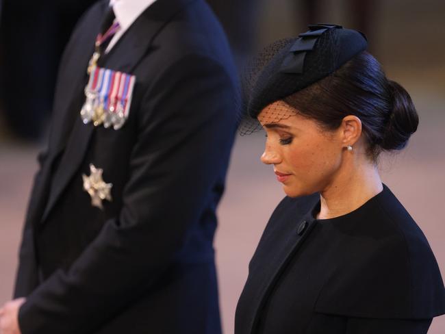 Meghan bowed her head during the service. Picture: Getty Images