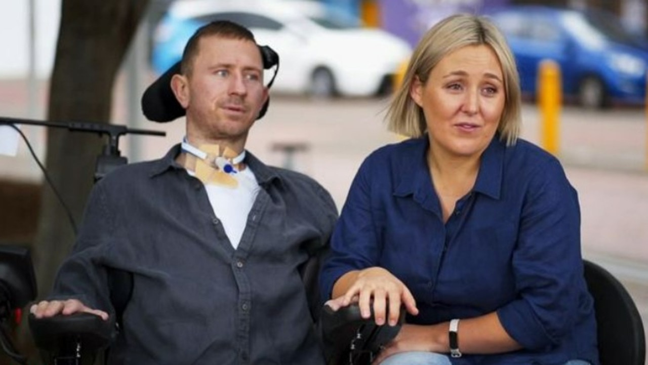 Former NRL player Nathan Stapleton in a wheelchair with his wife Kate. Picture: A Current Affair