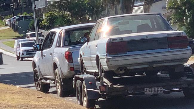 Cars on a trailer where Aaron Young was killed days after his 30th birthday in May 2020.