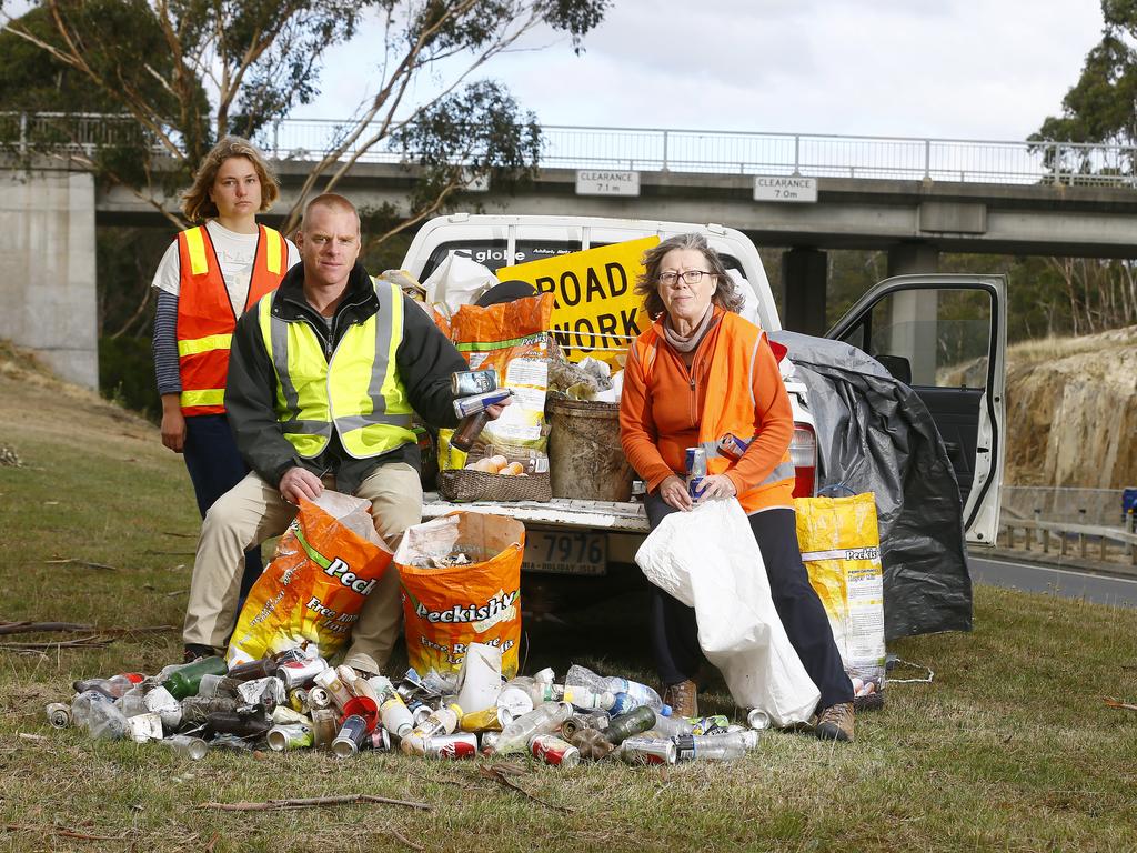 As the Tasmanian upper house elections gets closer, Independent candidate, Vica Bailey (second left) is pushing for a recycling buy back scheme, similar to that in South Australia. He is pictured on the Southern Outlet, Tolmans Hill where he collected a ute load of rubbish in less than a kilometre of highway with Ada Lester (left) and Caol Rea. Picture: MATT THOMPSON