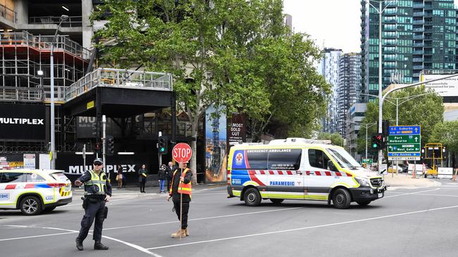 An ambulance leaves the scene of a construction site accident in Southbank. Picture: AAP