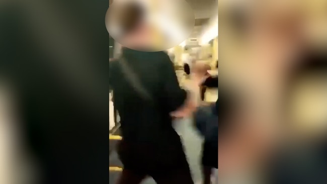 Images from a video capturing a violent attack on a train in Brisbane's bayside.