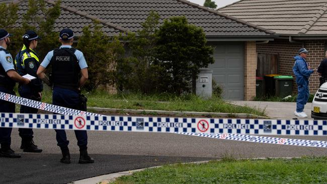 A woman’s body was found in the garage of a home at Minto. Picture: Monique Harmer