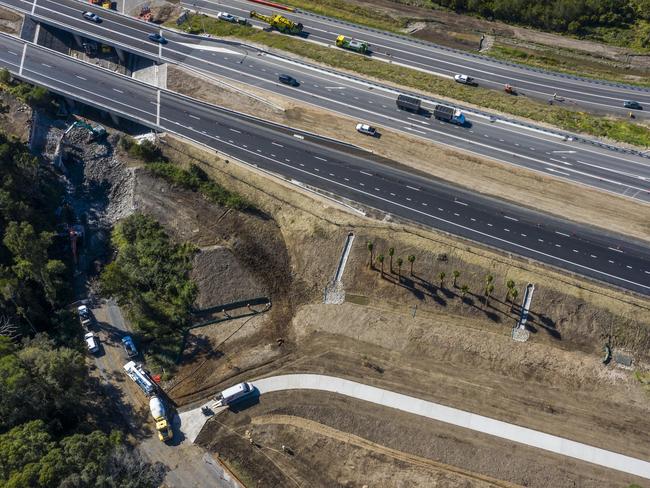 Work to bring the old Pacific Highway overpass near Townsend down now that Maclean Interchange has opened.