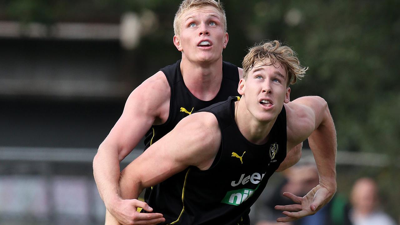 Tom Lynch battles with new teammate Ryan Garthwaite at training. Picture: Michael Klein