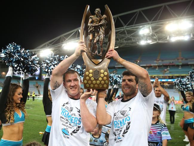 Gallen and Michael Ennis raise the trophy aloft. Picture AAP Image/Craig Golding