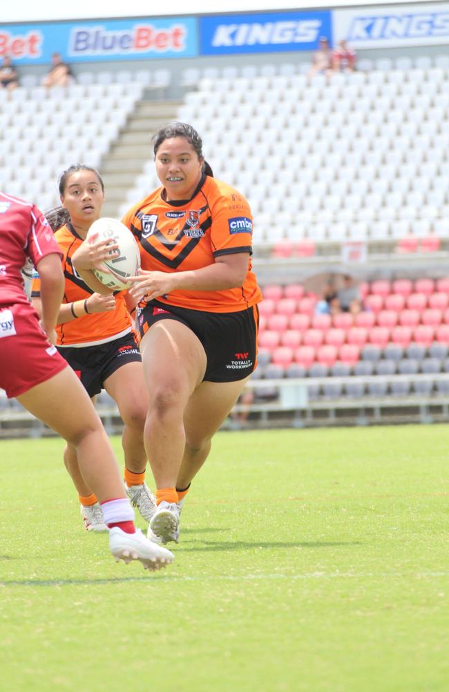 Alice Shannon on the charge for the Brisbane Tigers.