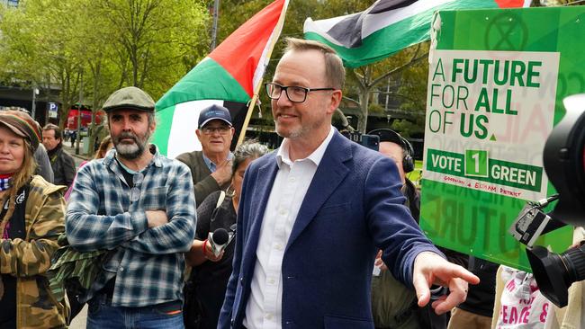 Judged by the company you keep … Greens senator David Shoebridge addresses anti-war protesters outside the Land Forces conference on Friday. Picture: NewsWire / Luis Enrique Ascui