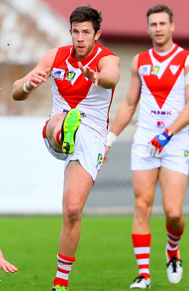 Aaron French takes a kick for Clarence.