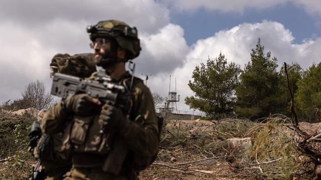 Israeli troops patrolling near a United Nations Interim Force In Lebanon base in the southern Lebanon's Naqoura region. Picture: AFP