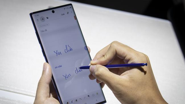 A man uses the S Pen on the new Samsung Galaxy Note 10 smartphone during a launch event at Barclays Center. Picture: Drew Angerer/Getty Images/AFP