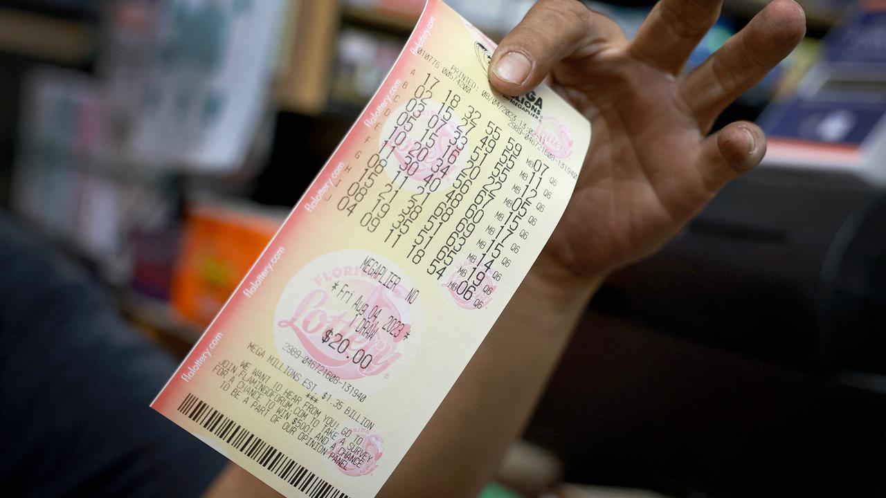 A single ticket has won the record-breaking US$1.58 billion Mega Millions jackpot. Picture: Angela Weiss / AFP.