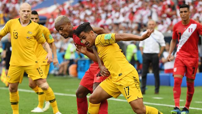 Daniel Arzani holds up the ball against Peru at the 2018 FIFA World Cup. Picture: AAP Image/Dean Lewins