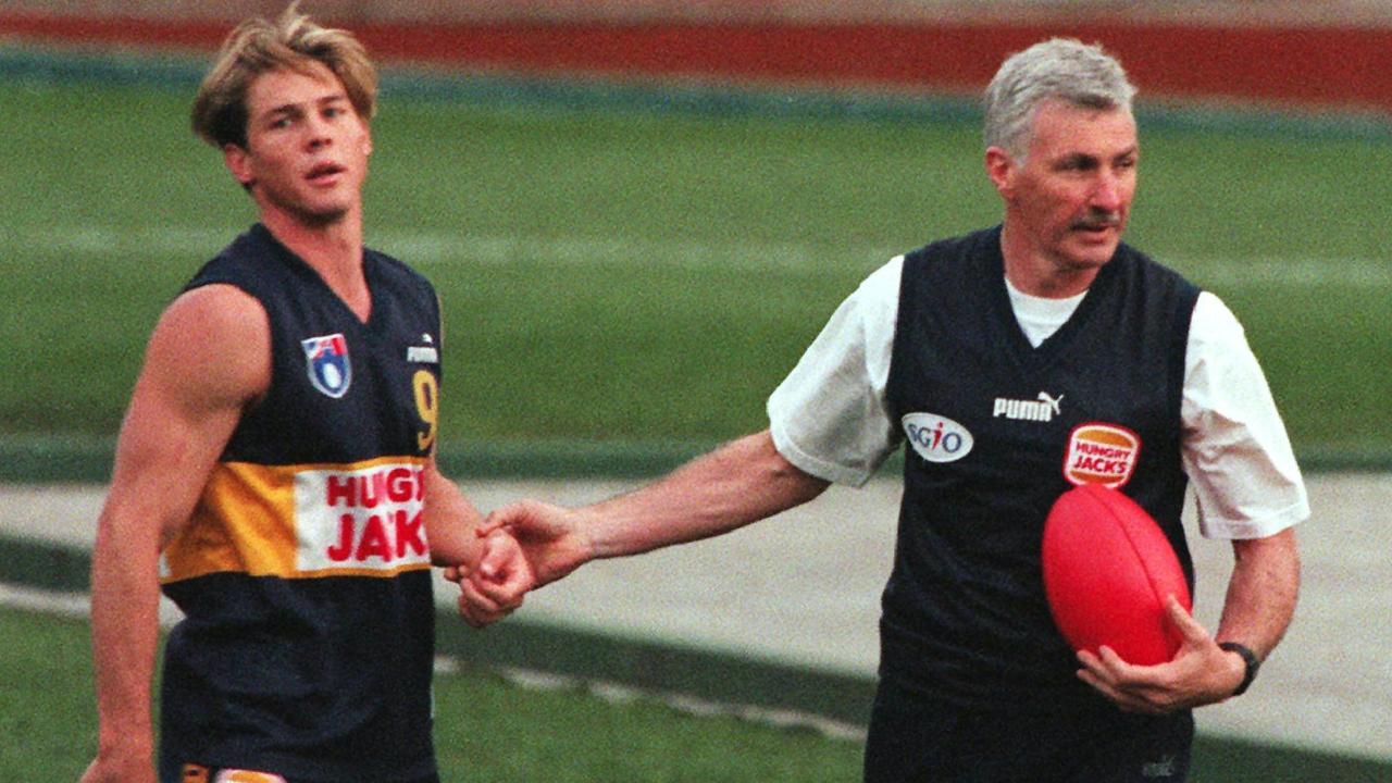 Mick Malthousewith Ben Cousins during a drill in 1999.