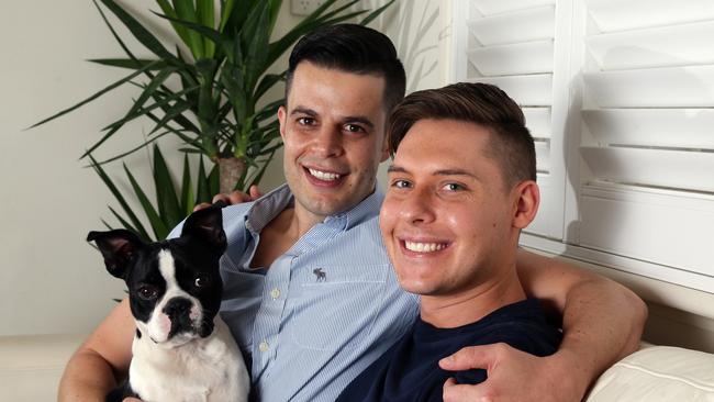 Chris Inzitari and his partner Sean Wheatley (with dog Charlie) are having twins through surrogacy. Picture: Craig Wilson