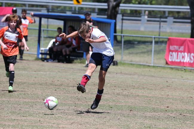 The Premier Invitational football tournament on the Gold Coast. Brisbane Roar Orange v TFC Brisbane White under-13s in action. Picture: Mike Batterham.