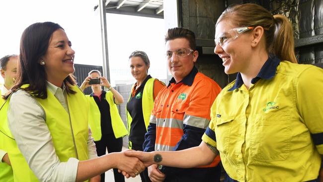 Queensland Premier Annastacia Palaszczuk greets apprentice Kahlyn Pryor as she visits the TAFE Skill Centre at Acacia Ridge. (AAP Image/Tracey Nearmy)